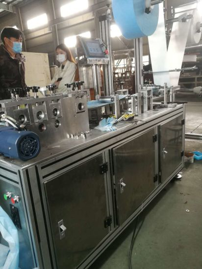 Las personas completamente automáticas Bsg-100 utilizan la máquina para fabricar mascarillas