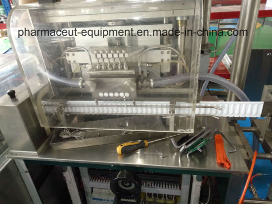 La máquina de sellado de llenado de líquido de supositorio automático de control PLC de línea recta cumple con GMP